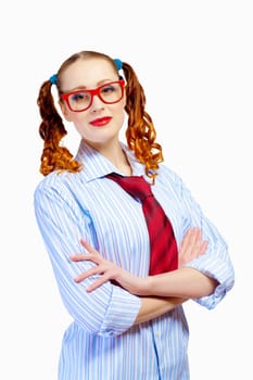 Teenager girl with pigtails in red glasses