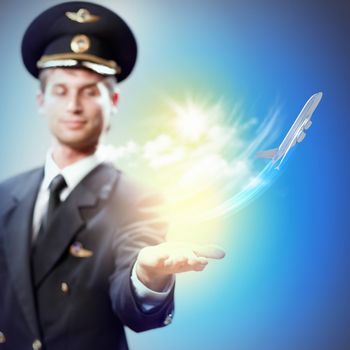 Image of pilot with airplane taking off from his hand