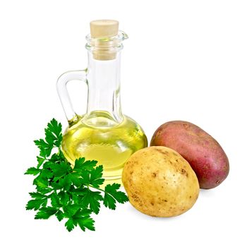 Red and yellow potatoes, a bunch of parsley, vegetable oil in a glass bottle isolated on white background