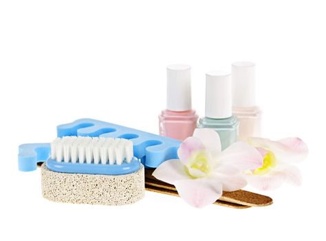 Pedicure accessories with nail polish on white background