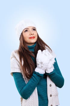 Young pretty woman with lomng hair wearing warm pullover