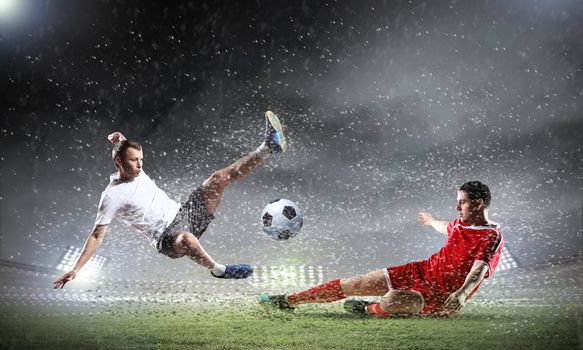 Image of two football players at stadium