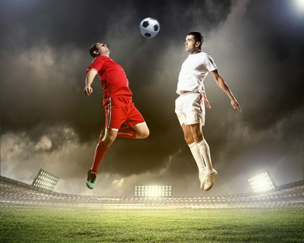 Image of two football players at stadium