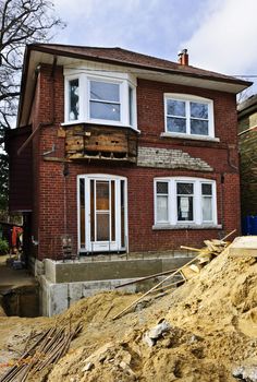 Exterior of a house under renovation at construction site