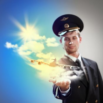 Image of pilot with airplane taking off from his hand