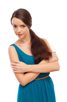 Beautiful young brunette woman in blue dress