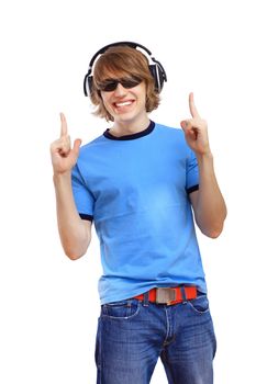 Happy smiling young man dancing and listening to music