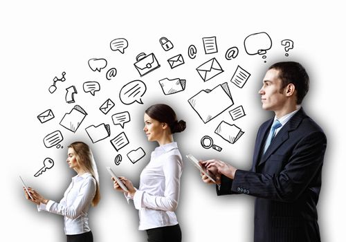 Three young people in business suits with tablet pc in hands