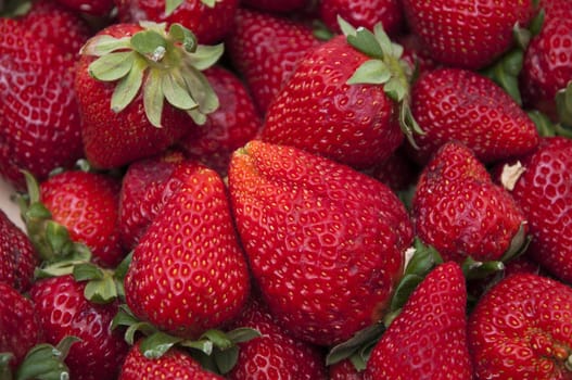 very sweet red strawberries with herbs