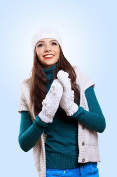 Young pretty woman with lomng hair wearing warm pullover