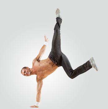 Modern style male dancer jumping and posing. Illustration