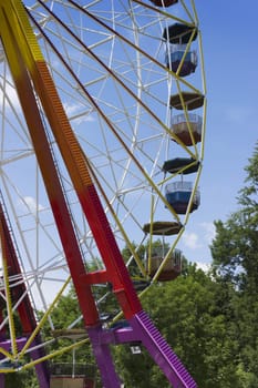 Ferris wheel in the park against the sky