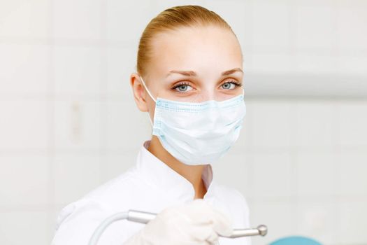 A portrait of a dental worker, dentist or assistant