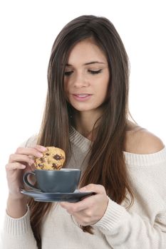 Woman Drinking a Cup of Tea and Biscuit