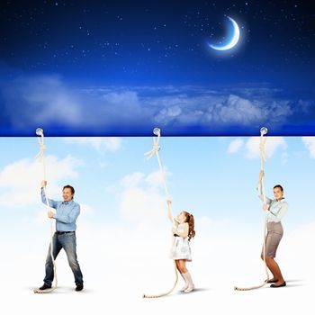 Image of young happy family pulling banner with night illustration