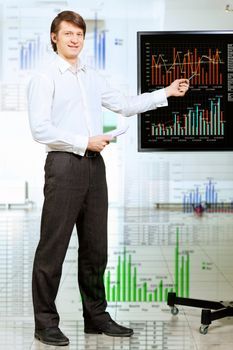 Image of young man making presentation on screen