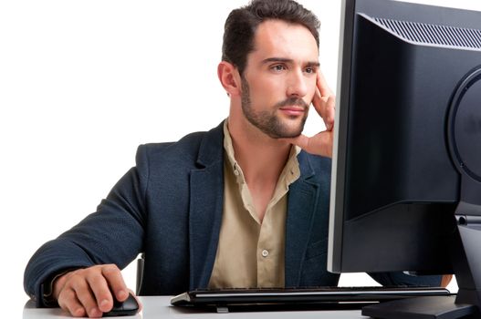 Man looking at a computer screen, thinking about the job at hand