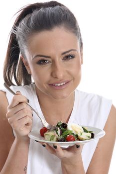 Model Released. Young Woman Eating Salad Nicoise