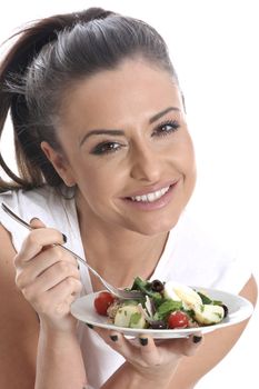 Model Released. Young Woman Eating Salad Nicoise