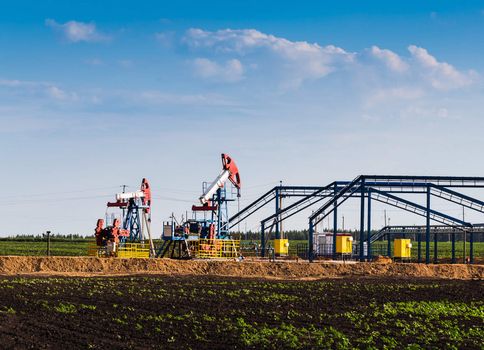 Oil and gas industry. Work of oil pump jack on a oil field