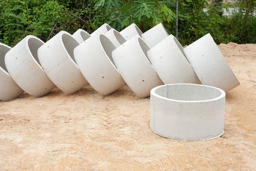 Some concrete tubes in the ground