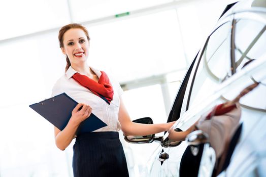 portrait of a young woman in a showroom consultant