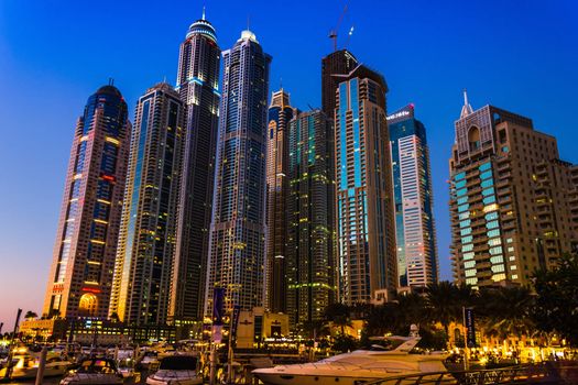 DUBAI, UAE - NOVEMBER 16: Nightlife in Dubai Marina. UAE. November 16, 2012. Dubai was the fastest developing city in the world between 2002 and 2008.