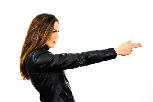 studio shot on white background: young beauty woman holding .44 Magnum handgun, ready to fight 