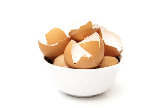 bowl with broken egg on a white background