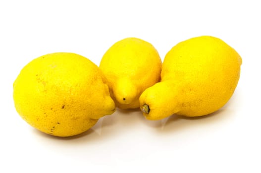 high acid lemons on a white background