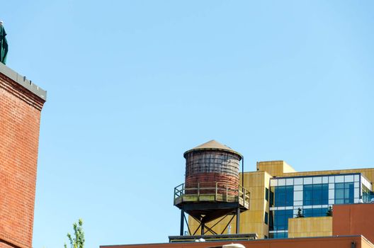 A water tower on top of a building near downtown Portland, Oregon