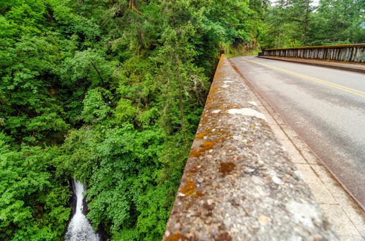 Waterfall in Oregon next to historic Highway 30