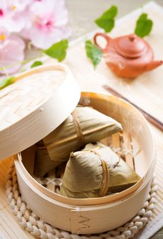 Rice dumpling or zongzi. Traditional steamed sticky  glutinous rice dumplings. Chinese food dim sum. Asian cuisine. 