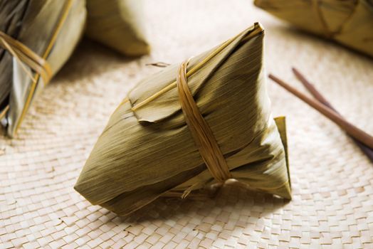 Zongzi or rice dumpling. Traditional steamed sticky  glutinous rice dumplings. Chinese food dim sum. Asian cuisine.