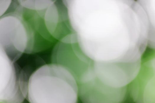 Blurred lights green bokeh abstract light background