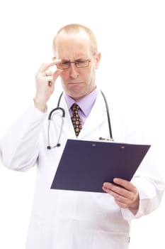 Male medical physician looking worried on patients record