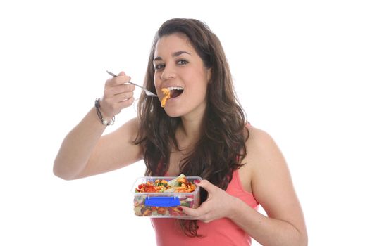 Model Released. Young Woman Eating Pasta Salad