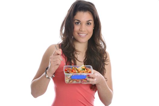 Model Released. Young Woman Eating Pasta Salad