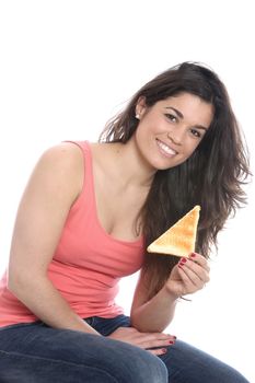 Model Released. Young Woman Eating a Slice of Toast