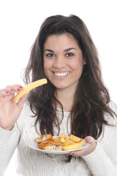 Model Released. Young Woman Eating Fish and Chips