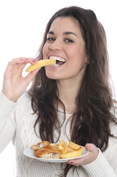 Model Released. Young Woman Eating Fish and Chips