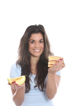 Model Released. Young Woman Holding Melon and Cake
