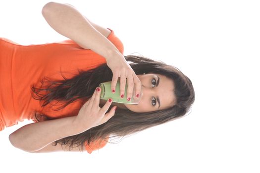 Model Released. Young Woman Drinking Apple and Asparagus Juice