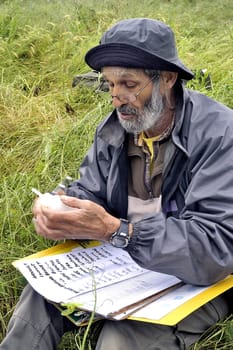 Cardet - France - May 18th, 19th and 20th, 2013 - European Cup of the gold diggers in river. controller labelling the bottles in the name of each concurents