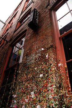 Gum travels up the wall at Maket Theatre Post Alley Seattle WA