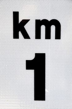 kilometer sign on a bright background