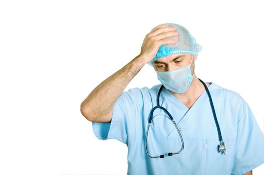 sad doctor with mask over white background