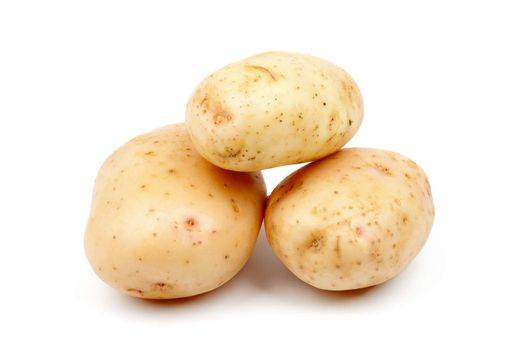 Heap of Three Raw New Harvest Potato isolated on white background