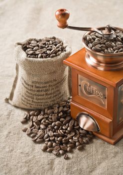 coffee beans in bag and coffee mill