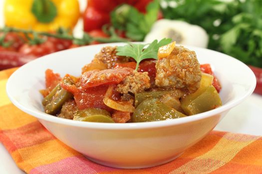 oriental vegetables pan with peppers, tomato and meatballs